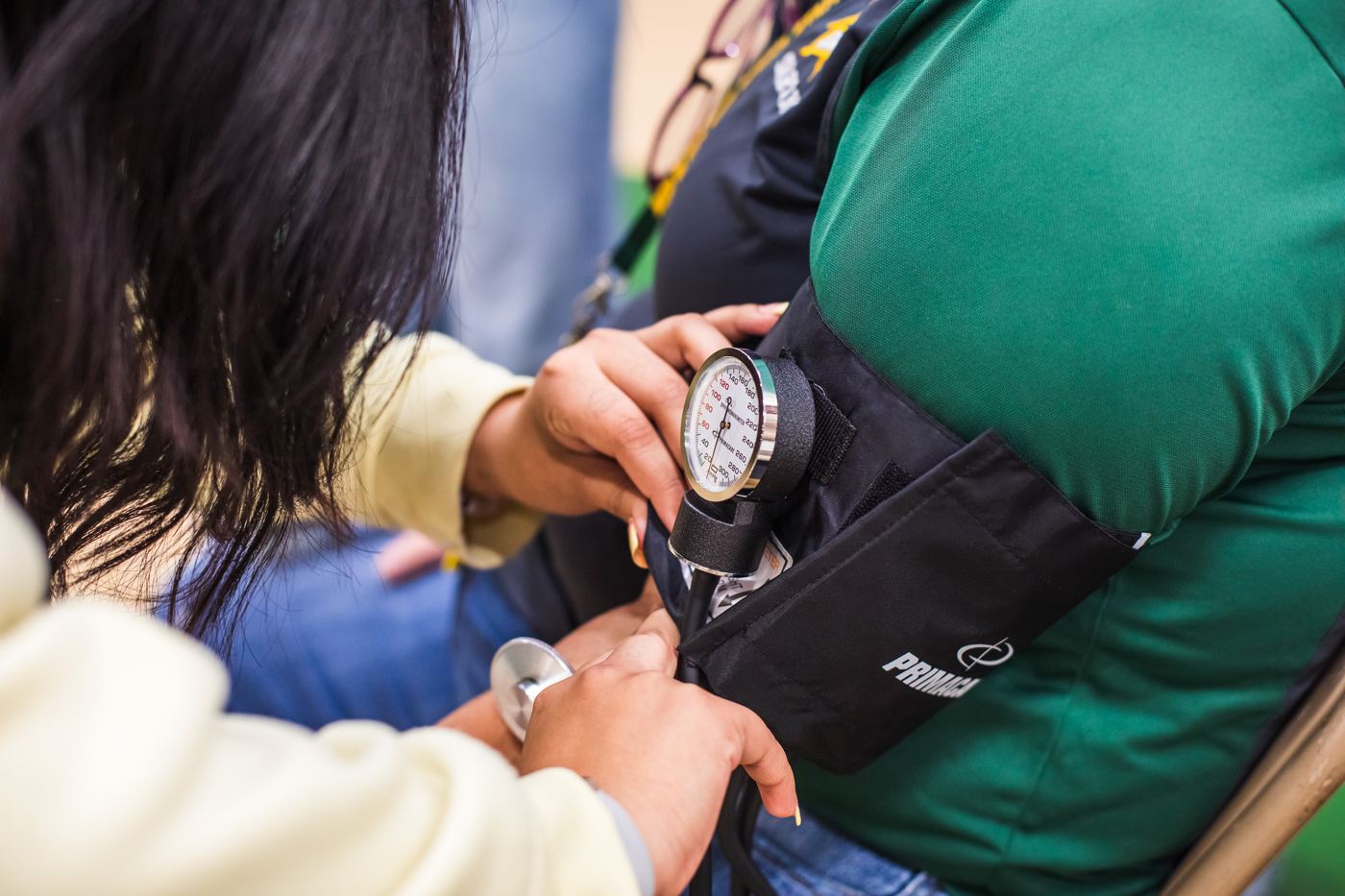 A technician reads a precision gauge during an inspection